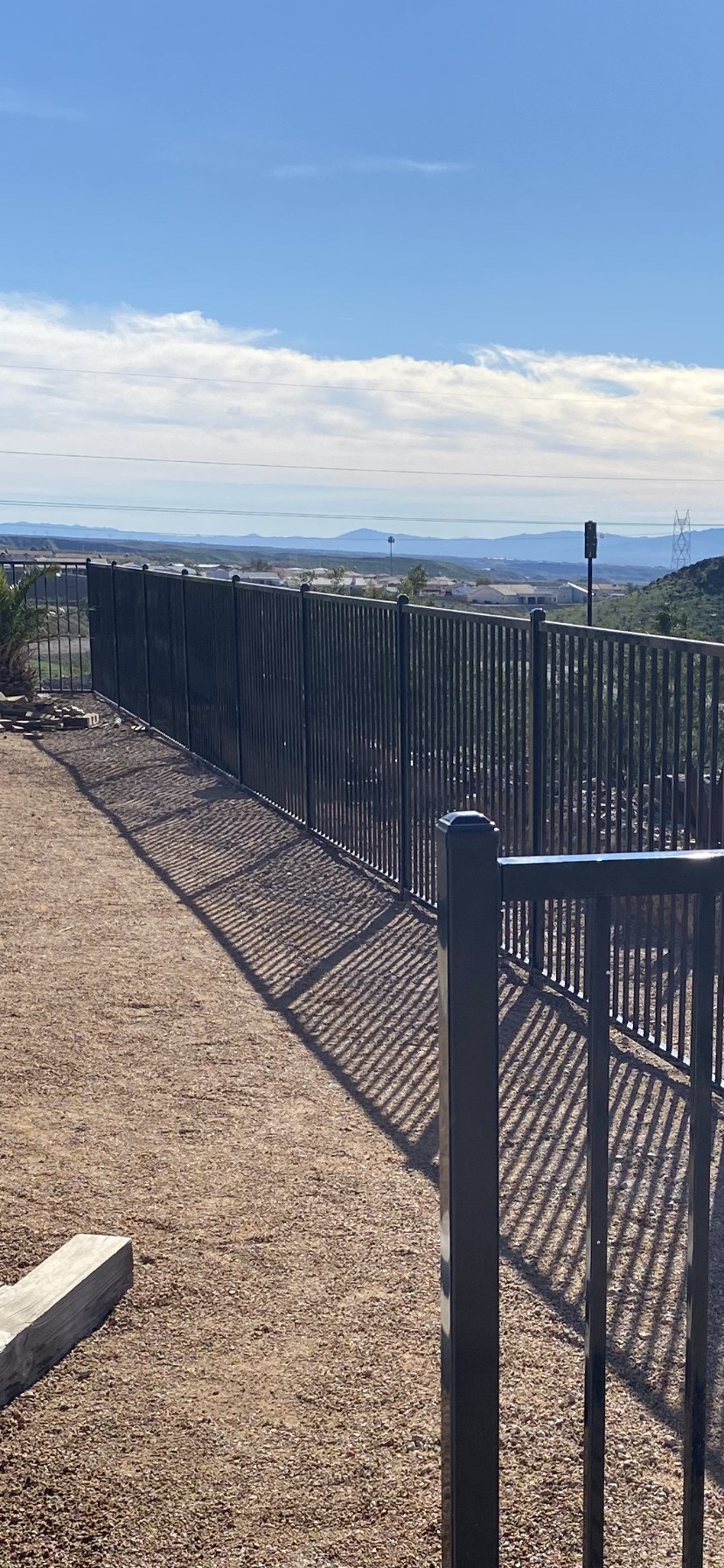 Completed wrought-iron fencing installed by Tri-City Fence